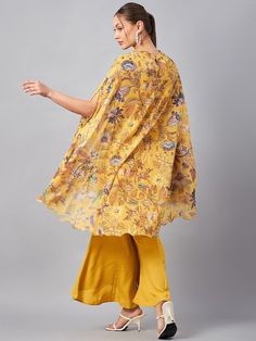 Please check the last image for a detailed size chart This co-ords consists of tunic and palazzos Yellow floral printed tunic, has round neck, flared sleeves Yellow solid mid-rise palazzos have slip-on closure and flared hem Material & Care Polyester Hand Wash/Dry Clean Pattern: Embroidered, Floral Print Style: Co-ord Set, Wedding Guest Outfit Dispatch within 7 days Flared Palazzo, Kaftan Tunic, Indian Suits, Co Ords, Print Style, Co Ord Set, Guest Outfit, Western Outfits, Wedding Guest Outfit