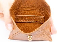 Our Coin Leather Pouch pairs perfectly with our collection - handcrafted with the same focus on detail and sustainable values. Made from top-quality genuine leather, each pouch exudes a premium feel and stylish design. Limited quantities, responsibly sourced, and designed to elevate your daily essentials. Classic Leather Envelope Coin Purse, Brown Soft Leather Pouch For Everyday, Elegant Brown Coin Purse For Everyday, Everyday Leather Envelope Pouch, Classic Brown Pouch For Everyday, Classic Everyday Pouch With Interior Card Slots, Classic Brown Everyday Pouch, Leather Envelope Coin Purse With Coin Pocket, Leather Envelope Coin Purse For Everyday