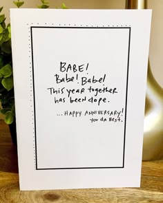 a white card with black writing on it that reads babe babe babe this year to experience has been done happy anniversary you dad best