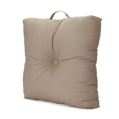 a square pillow with a button on the side and a ring at the end of it