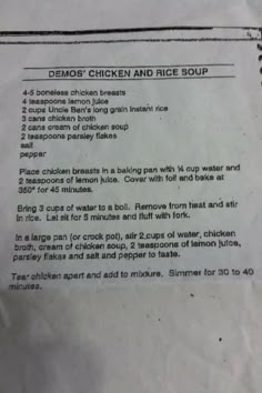 a recipe for chicken and rice soup is shown in the paper on the counter top