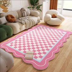 a living room with a pink rug on the floor