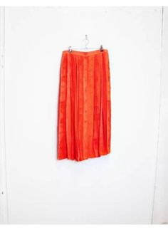 "a vintage orange button-down midi-skirt ✿ IMPORTANT INFORMATION: * decent vintage condition - marks pictured (price reduced) * material: 100% viscose * size: large - please check exact measurements below (they're there for your benefit!) * garment care: machine washable ✿ MEASUREMENTS (taken while item is lying flat, some measurements will need to be doubled): * waist: 14-16\" (36-41cm) - elasticated * hips: wide/loose * length: 32\" (81cm) ✿ free UK shipping on orders over £100 with code STRAW Button Down Midi Skirt, Orange Midi Skirt, Orange Skirt, Skirt Vintage, Vintage Orange, Vintage Button, Vintage Skirt, Tie Dye Skirt, Women's Skirt