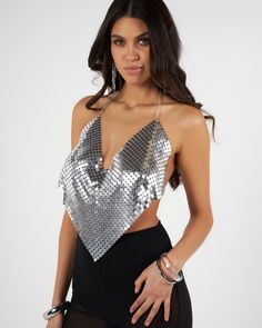 Silver shiny chainmail V-neck top Elegant V-neck Mesh Top For Party, Glamorous Mesh Top For Party Season, Glamorous Sequined Mesh Top For Party, Silver Tops For Club And Party Season, Glamorous Party Mesh Top With Sequins, Glamorous Mesh Top For Club And Party Season, Silver Disco Top For Evening, Glamorous Metallic Tops For Club, Glamorous V-neck Crop Top For Night Out