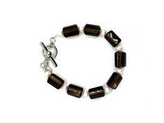 barrel-shaped smokey quartz and white freshwater pearl bracelet with a sterling silver toggle clasp Elegant Brown Bracelet With Lobster Clasp, White Pearl Bracelet, Freshwater Pearl Bracelet, White Freshwater Pearl, Smokey Quartz, Toggle Clasp, White Pearl, Stone Bracelet, Pearl Bracelet