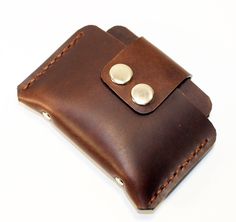 "Leather credit card wallet! Very comfortable & easy to wear. Color:brown. Size: 8 x 12 cm. It has 3 interior sleeves holds Nearly 12 cards , also Suitable for holding some cash. And it also can be used as a business card holder . This wallet created from hight quality \"Crazy horse leather\"! Crazy horse leathers are made by applying a special kind of wax to a full grain leather surface that has been buffed and smoothed out. The type of wax used rests independently upon the leather fibers a Brown Travel Pouch With Card Slots, Brown Leather Pouch With Interior Card Slots, Brown Pouch With Cell Phone Pocket For Everyday Carry, Travel Brown Pouch With Card Slots, Brown Rfid Blocking Wallet For Personal Use, Brown Travel Coin Purse With Card Slots, Brown Leather Card Holder With Cell Phone Pocket, Brown Card Holder With Cell Phone Pocket As Gift, Brown Card Holder With Cell Phone Pocket For Gift