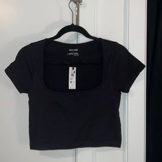 Garage Seamless Open Scoop Neck Tank Top Tee Jet Black Size Large. Ribbed, Stretchy Material. Great Condition, Never Worn, Tags Still On. Low Scoop Neck Top, Trendy Black Crop Top With Scoop Neck, Casual Black Seamless T-shirt, Trendy Black Scoop Neck Crop Top, Basic Black Crop Top With Scoop Neck, Casual Black Crop Top With Scoop Neck, Casual Black Scoop Neck Crop Top, Black Cotton Scoop Neck Crop Top, Trendy Black Scoop Neck Top