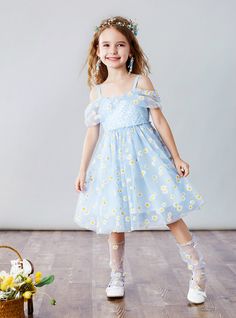 You are sure to find the perfect dress for the flower girl at Kemedress.com. you will find a variety of options to choose from and every option will give you hard time with how likeable it is. Take this white A-line frock, for example, it has an irresistible aura that can charm the onlookers. The top of the dress features a see-through scoop neckline. White satin forms adorable vertical pleats on the bodice. The pleats are further accentuated with beadings. The tulle skirt below has an ankle length hemline and makes the dress even more classy. Pair this charming dress with classy pumps and your flower girl is all set to go. Daisy Shorts, Sequined Skirt, Black Backless Dress, Blue Tulle, Flower Girl Dress, Hard Time, White Satin, Daisy Flower, Girl Dress