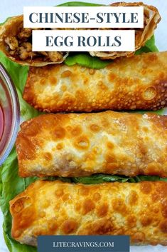 three chinese style egg rolls with lettuce and sauce