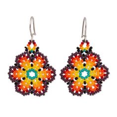 Displaying the gleaming hues of a rainbow of colors this pair of dangle earrings is handcrafted of petite glass beads. Mexican artisan Adriana Trejo designs the earrings hanging them from hooks of sterling silver. Multicolor Beaded Drop Flower Earrings, Multicolor Beaded Flower Drop Earrings, Multicolor Nickel-free Dangle Flower Earrings, Nickel Free Multicolor Dangle Flower Earrings, Rainbow Beaded Czech Glass Jewelry, Nickel-free Multicolor Dangle Flower Earrings, Multicolor Handmade Teardrop Flower Earrings, Adjustable Multicolor Flower Earrings With Colorful Beads, Handmade Multicolor Teardrop Flower Earrings