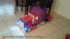 a toy truck made to look like it is sitting in the middle of a room