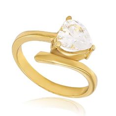 a gold ring with a white stone in the center