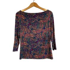 Brand: Talbots Color & Print: Blue With Purple, Aqua, Red And Gold Print. Fabric: Rayon And Spandex. Machine Washable. Sleeves: 3/4. Neckline: Boat Neck. Details: In Excellent Nwt Condition. No Stains Or Flaws. Measurements: Approximately 18" Across The Chest And 23.5" Length. Non-Smoking Home. Spring, Summer, Fall, Winter, Casual, Colorful, Bright, Paisley, Preppy, Dopamine Dress, Soft, Lightweight, Patterned 3/4 Sleeve Tops For Fall, Casual Purple Top With Paisley Print, Fall Multicolor Paisley Print Blouse, Multicolor Fitted Tops With 3/4 Sleeves, Fitted Multicolor Tops With 3/4 Sleeve, Casual Purple Paisley Print Top, V-neck Paisley Print Top For Spring, Fall Paisley Print Button-up Blouse, Fall Paisley Print V-neck Blouse