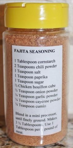 a jar filled with seasoning sitting on top of a counter