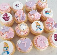 there are many cupcakes that have been decorated with princesses and numbers on them