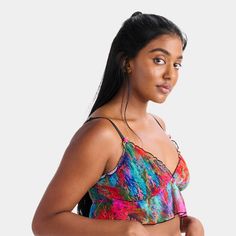 The day-to-night bralette you can wear under your favorite t-shirt or with your favorite pair of jeans. Delicate ruffle and rosette details give you that extra oomph so you can feel confident from your very first layer. Make it a matching set with the Silky Mesh Flutter Cheeky. The breathable Silky Mesh layer is made from recovered manufacturing scraps. Since launching in 2019, the brand has grown to be dubbed “the internet’s favorite underwear.” Everything Parade creates is designed with thousa Multicolor Bra-friendly Tops For Summer, Summer Multicolor Bra-friendly Tops, Summer Multicolor Crop Top With Built-in Bra, Trendy Summer Crop Top Bra, Summer Triangle Top Bra Friendly Camisole, Summer Bra-friendly Triangle Top Camisole, Summer Triangle Top Camisole, Bra Friendly, Summer Bra With Spaghetti Straps, Trendy Summer Bra With Adjustable Straps