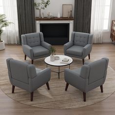 a living room with four chairs and a coffee table