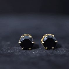 Product Details Elevate your style with these exquisite Solitaire Stud Earrings, each adorned with a round shape Black Onyx Gemstone, elegantly cradled in a secure 6 Claw Prong Setting. These earrings exude sophistication and individuality, making them the perfect addition to your jewelry collection for any occasion. Product Information SKU SHP-EARRINGS042157495 Weight 1.68 gm (Approximate) BLACK ONYX INFORMATION No.of Stones 2 Pieces Total Weight 4.00 Carat (Approximate) Dimension(approx) Round Claw Prong, Claw Setting, Solitaire Studs, Onyx Gemstone, Black Onyx, Round Shape, Prong Setting, Onyx, Jewelry Collection