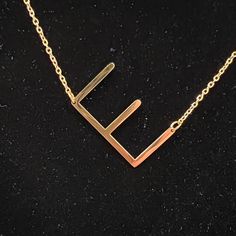 Customize Your Style With This 14k Gold Plated Necklace With An Initial Pendant - 14k Gold Plated Initial Pendant Necklace - Lobster Clasp - Approx. 18" Length - Adjustable 16-18 Inches - Approx. 1 Pendant- - Imported Please Note: You Will Receive One Necklace Wipe Clean With Soft Cloth. 14k Gold Plated Stainless Steel With Rhodium Pristine Condition- Brand New With Tags Gold E Necklace, E Necklace, Bronze Chain Necklace, Cuban Link Necklace, Sterling Silver Initial, Celestial Necklace, Gold Statement Necklace, Initial Pendant Necklace, Letter E