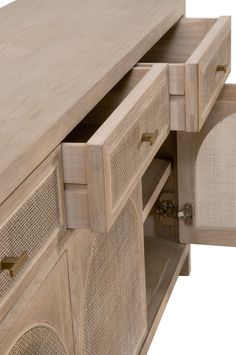 a close up of a wooden cabinet with drawers