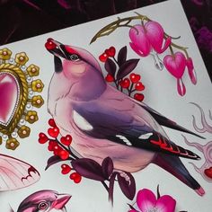 a painting of birds and flowers on a piece of paper with heart shaped mirror in the background