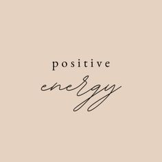 the words positive energy written in black ink on a beige background