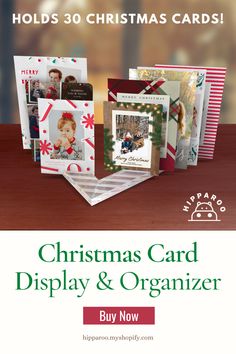 the christmas card display and organizer is shown