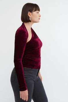 FINAL SALE - NO RETURNS, EXCHANGES, OR STORE CREDIT Sophisticated meets oh-so-soft. Handcrafted from sumptuous velvet jersey, our Manhattan Velvet One Shoulder Top feels like a hug. She's designed with our iconic wrap-around neckline and elongated bodice for a look that's sleek and any occasion-friendly. Easy to style, she'll quickly become your best friend for nights out.[SPLIT] Natalee, in crimson, is 5'10" (178 cm) tall, wearing size M. Sam, in black, is 5'8" (173 cm) tall, wearing size XS. A Velvet Tops For Winter Night Out, Chic Velvet Tops For Winter, Fall Evening Velvet Tops, Velvet Stretch Top For Party, Velvet Tops For Fall Night Out, Chic Velvet Evening Top, Chic Velvet Top For Evening, Velvet Stretch Tops For Night Out, Chic Velvet Party Tops