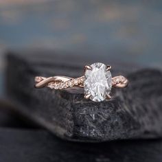 a close up of a ring on a rock