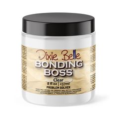 a jar of dixie belle bonding boss clear paste on a white background with black lid