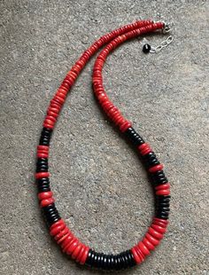 Sterling Silver Graduated Black Onyx with Coral Bead Necklace. 18 Inch Black Single Strand Bohemian Beads, Black Bohemian Single Strand Beads, Bohemian Black Single Strand Beads, Traditional Black Single Strand Necklace, Hand-strung Black Beaded Necklaces, Hand-strung Black Beaded Necklace, Coral Beads Necklace, Turquoise Bead Necklaces, Cluster Pendant