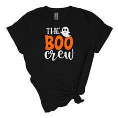 The Boo Crew Halloween T-Shirt Get ready to celebrate the spookiest season with our exclusive Boo Crew Halloween T-Shirt! Perfect for trick-or-treating, parties, or cozy nights in, this shirt is designed to bring festive fun to your wardrobe. Key Features: Playful Design: Choose between a bold solid "BOO" or a sparkling glitter "BOO" to match your style. Both options feature a fun, eye-catching font that captures the spirit of Halloween! Comfortable Fit: Made from soft, breathable fabric, this t Halloween Costume Party T-shirt With Letter Print, Halloween Letter Print T-shirt For Costume Party, Halloween Costume Party Letter Print T-shirt, Black T-shirt With Letter Print For Costume Party, Black Crew Neck T-shirt For Costume Party, Spooky Letter Print T-shirt For Costume Party, Spooky Black T-shirt For Costume Party, Themed Black T-shirt With Funny Print, Black Themed T-shirt With Funny Print