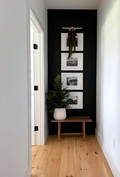 the hallway is clean and ready to be used as a place for pictures or other things