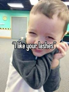 a little boy that is holding his head with the caption i like your lashes