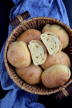 a basket filled with bread on top of a table