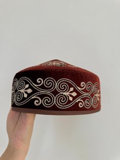 This stunning Kazakh & Kyrgyz headdress is a traditional piece of clothing worn in Central Asia, particularly in Kazakhstan and Kyrgyzstan. It is an important part of the region's cultural heritage, and has been worn by women for centuries. Made with high-quality materials and featuring intricate embroidery and beadwork, this headdress is a true work of art. The design is inspired by the Silk Road, the ancient trade route that connected China to the Mediterranean. The headdress is adorned with c Handmade Skulls, The Silk Road, Cultural Festival, Intricate Embroidery, Silk Road, World Cultures, Central Asia, Turbans, Cultural Heritage