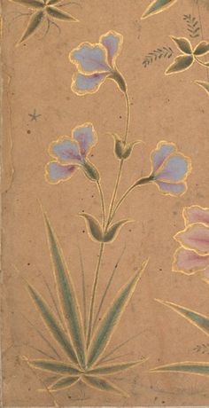 an old book with flowers and leaves painted on the front cover in pastel colors