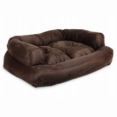 a dog bed that is brown in color