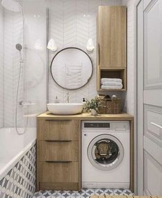 a washer and dryer in a bathroom with white tiles on the floor,