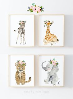 three pictures of animals are hanging on the wall next to each other, one has an elephant and two giraffes