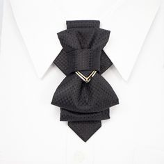 "This tie is our absolute bestseller tie! A black wedding tie with a unique design is a high-quality, hand-made accessory that is suitable for both men and women. It combines traditional elements found on both ties and bow ties to create a modern and versatile look that is perfect for weddings and other formal occasions. The tie is made from premium materials, ensuring that it is durable and long-lasting. The black color gives it a classic and timeless appeal, while the unique design adds a touc Tie Alternatives, Different Tie Knots, A Black Wedding, Wedding Color Schemes Spring, Black Bowtie, Unique Bow Tie, Groom Bowtie, Black And White Ribbon, Gender Neutral Clothes