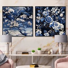 two blue and white paintings in a living room