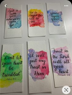 four watercolor cards with bible verses on them