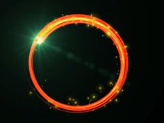 a glowing orange ring on a black background with bright lights in the middle and around it