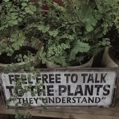 there is a sign that says free to talk to the plants they understand