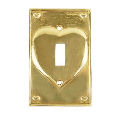 a light switch cover with a heart on it