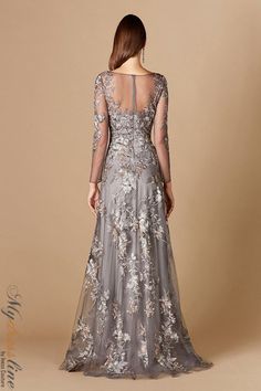 Looking for an elegant dress to wear to your next special event? Check out the Lara 29327 from the Spring 2022 evening collection. This gorgeous gown features a sleeveless design, a V-neckline, and beautiful ruching throughout. You'll love how you look and feel in this stunning dress! Motb Dress, Long Skirt Fall, Mother Of The Groom Gowns, Gala Gowns, Evening Gowns With Sleeves, Mother Of The Bride Dresses Long, Long Sleeve Evening Gowns, Mother Of The Bride Gown, Exquisite Gowns