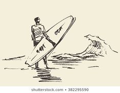 a man holding a surfboard standing in the water