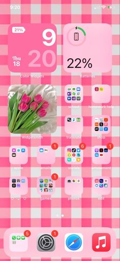 a pink and white checkered table cloth with different icons on the bottom right hand corner