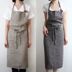 two women wearing aprons standing next to each other